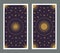 Back of Tarot card decorated with stars, sun and moon