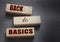 Back to basics text on wooden cubes. fundamental principles concept