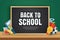 Back to school banner with education items on black chalkboard background in paper art style