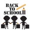 Back to school black inscription three silhouettes of schoolchildren of different nationalities with briefcases, ruler and books,