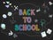 Back to school Colorful doodle chalk drawing with pastel chalks,  pastel colour cute stationery elements drawn on a blackboard