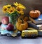 Back to school concept, autumn group composition with sunflowers, pumpkins, apples, fall leaves, toys and books