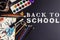 Back to school concept text white chalk on black board, colorful