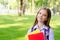 Back to school. Education concept. Cute smiling schoolgirl outdoor. Happy little girl child with backpack