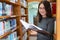 Back to school education knowledge college university concept, Beautiful female college student holding her books smiling happily