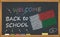Back to school with learning and childhood concept. Banner with an inscription with the chalk welcome back to school and the Madag