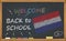 Back to school with learning and childhood concept. Banner with an inscription with the chalk welcome back to school and the Nethe