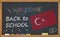 Back to school with learning and childhood concept. Banner with an inscription with the chalk welcome back to school and the Turke