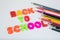 Back to school letters and multicoloured pencils