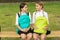 back to school. two smiling teen children after school outdoor. friendship of school girls