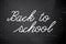 Back to school white illustration on chalkboard