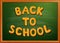 Back to school written on blackboard