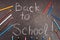 Back to school written on chalkboard