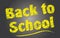 Back to School in Yellow Chalk on Chalkboard
