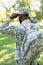 back view of african american soldier in military uniform and bag wearing cap