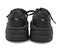 Back view of black PUMA sneakers with white Puma logo