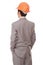 Back view of businessman in orange builder\'s helmet