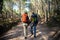 Back view of fond couple of young hikers