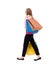 Back view of going woman with shopping bags