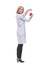 Back view of a lab scientist woman with gloves observes a beaker