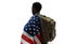 Back view of male ranker holding American flag.