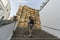 Back view of a male tourist climbing the stairs near Basilica de Santa Maria de la Asuncion in Spain