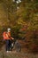 Back view of a man with a bicycle and red backpack against the blue sky. cyclist rides a bicycle.