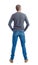 Back view of man in jeans.