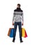 Back view of man in winter sweater with shopping bags