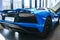 Back view of a new Lamborghini Aventador S coupe. Headlight. Car detailing. Car exterior details