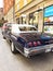 Back view of old retro classic car Chevrolet Impala SS 1965 on city street. Car detailing