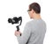 Back view of professional videographer using dslr camera on gimbal stabilizer isolated on white