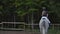 Back view of rider on a horse. Back view of a rider with a horse slow motion 120 fps