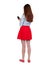 Back view of standing young beautiful woman using a mobile phon