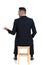 Back view of a talking businessman gesturing and sitting