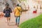 Back view of tourists walk on feet in the Red Stream  it also named Fairy Stream with Beautiful scenic landscape with red river