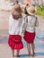 Back view of tourists walk on feet in the red stream  it also named fairy stream with beautiful scenic landscape with red river