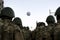 Back view of Turkish soldiers on the day of Republic Turkey and a balloon with crescent and star shape which is a Turkish flag