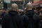 Back view of two skinhead neo-nazis with shaved heads in street