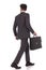 Back view of a walking businessman with briefcase