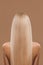 back view of woman with long blond hair,