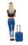 Back view of woman with suitcase