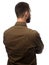Back view of young bearded businessman