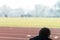 Back View of Young Excited Man on Bleachers