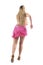 Back view of young latino blonde dancer dancing bachata in pink professional costume
