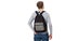 Back view. Young man wearing blank long sleeve t-shirt and backpack isolated on white background. Copy space. Student