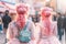 Back view of young woman in Japanese Harajuku street fashion style with pastel colored hair and cute clothes