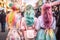 Back view of young woman in Japanese Harajuku street fashion style with pastel colored hair and cute clothes