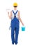 Back view of young woman painter in blue coveralls with builder\'