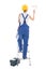 Back view of young woman painter in blue coveralls standing on l
